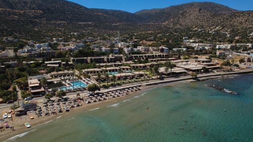 Free Discover the stunning aerial view of a luxury beachfront resort in Stalída, Crete. Stock Photo