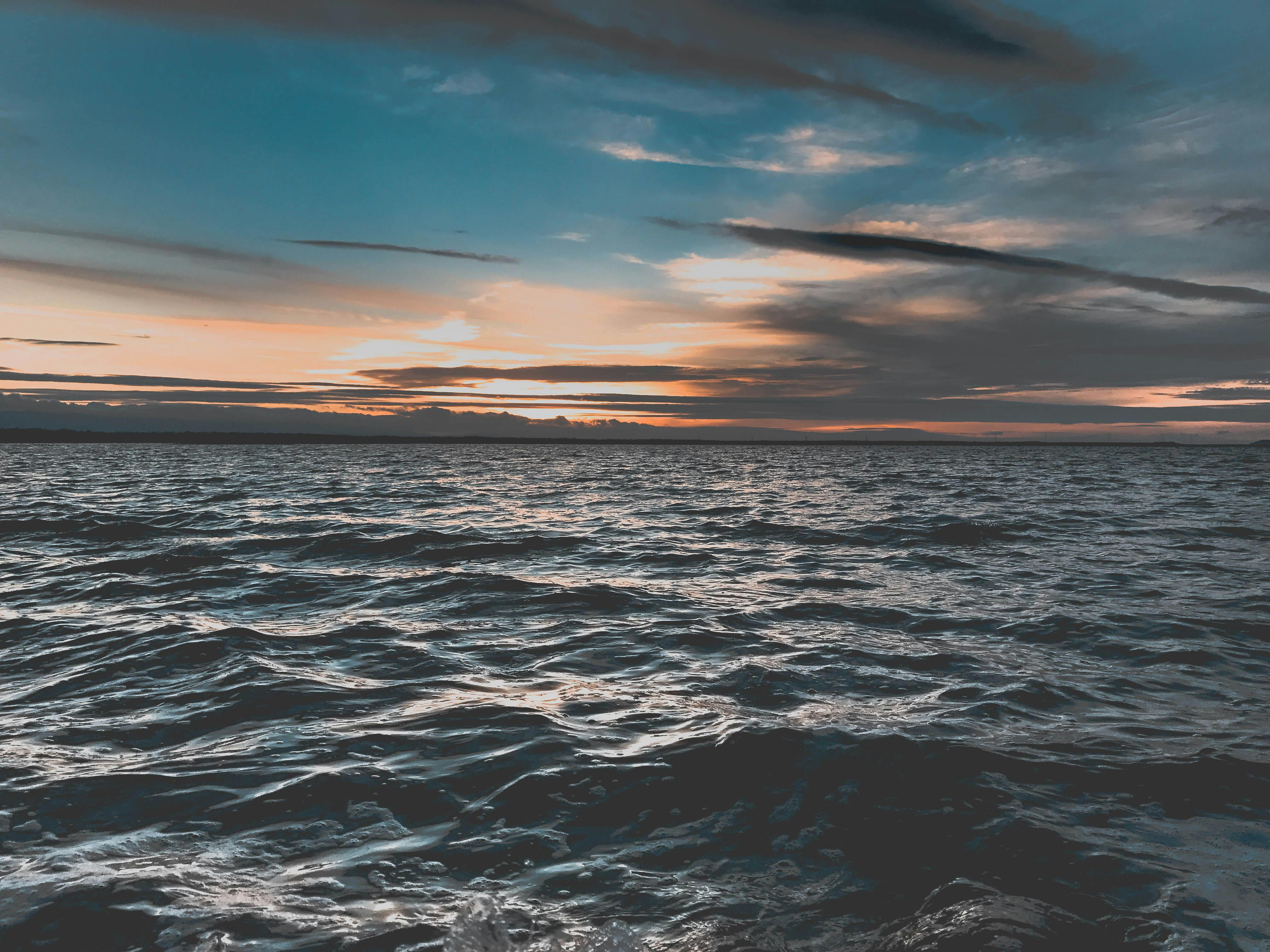 Happy New Year >> Blue Body of Water Under White Clouds · Free Stock Photo Happy New Year >> Blue Body of Water Under White Clouds · Free Stock Photo
