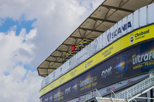 Free A stadium facade featuring Chobani and sports brand ads with a Turkish flag. Stock Photo