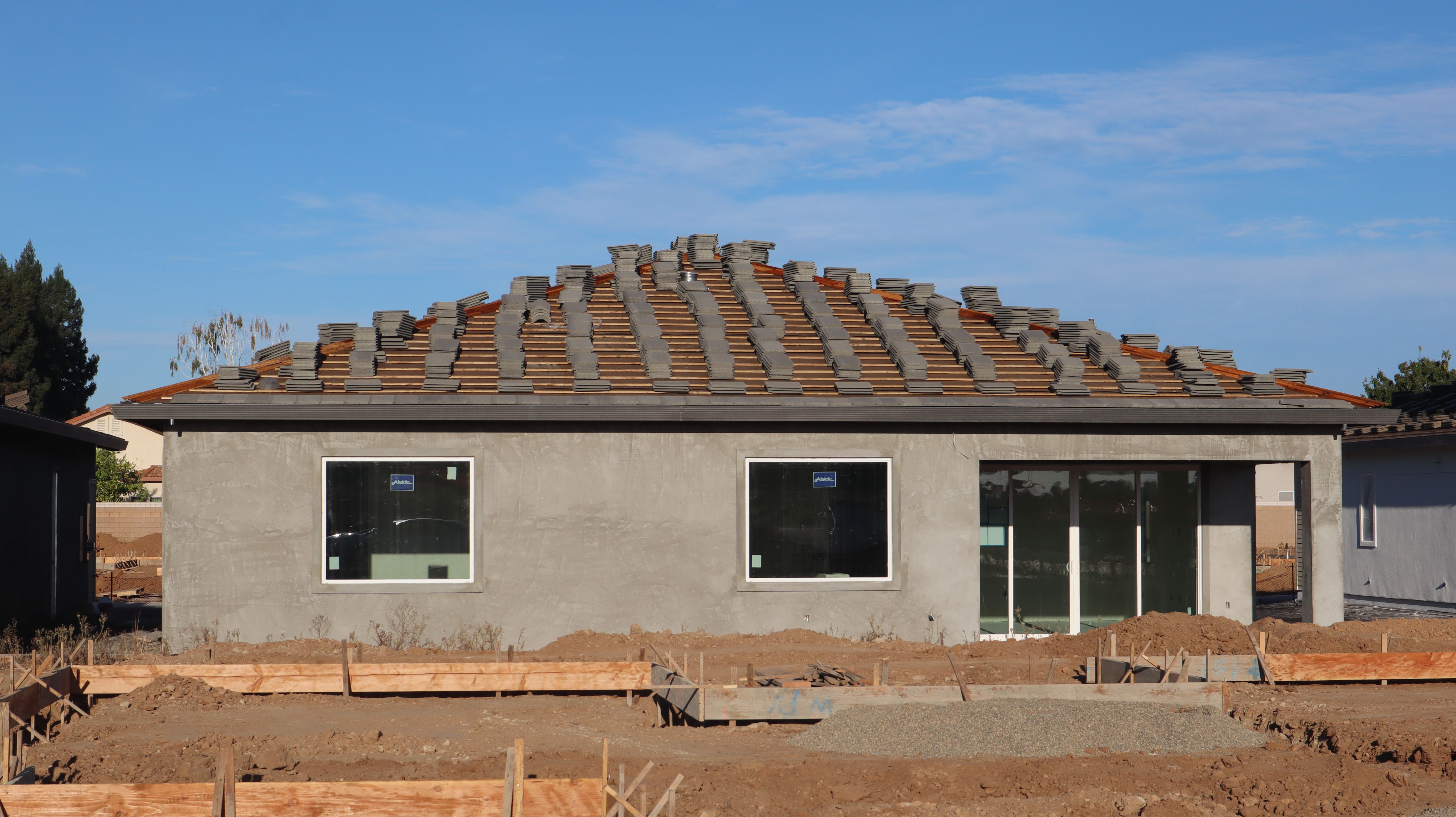 New home with a tile roof in California