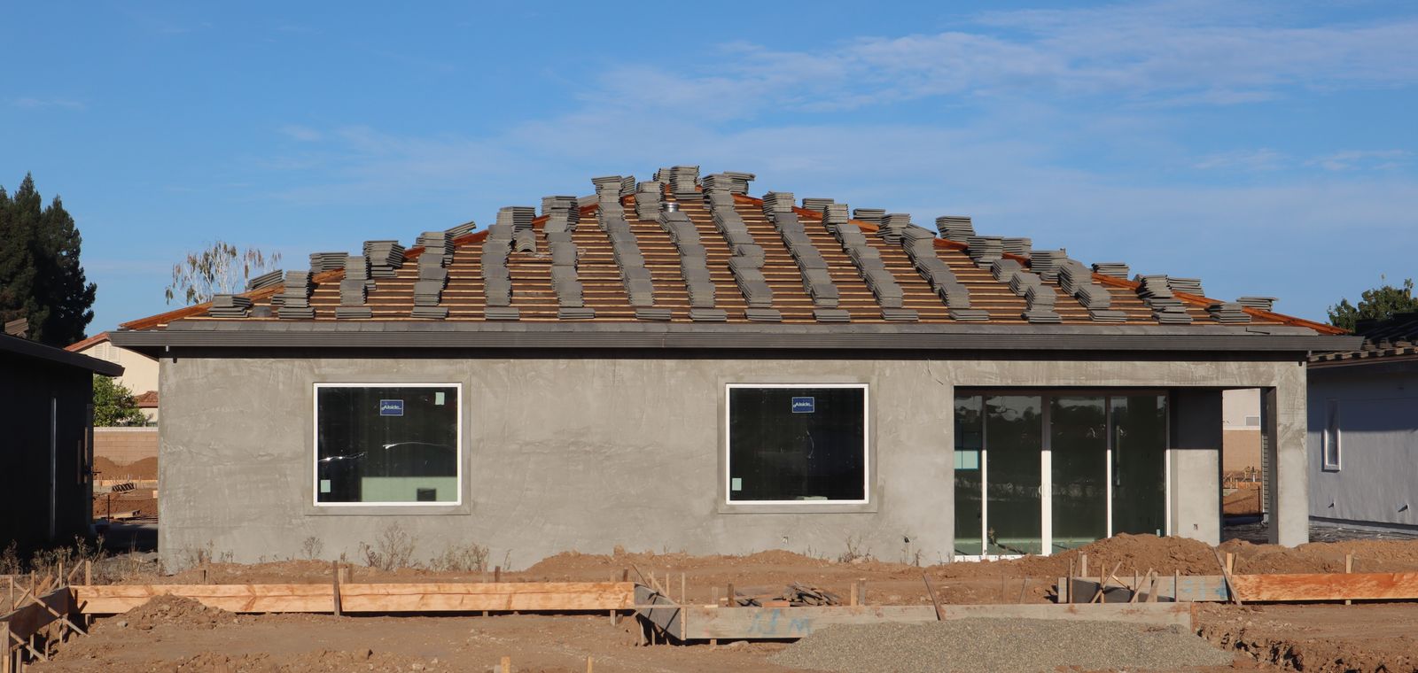 New home with a tile roof in California