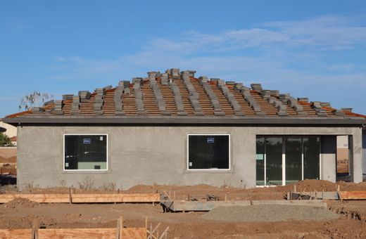 New home with a tile roof in California