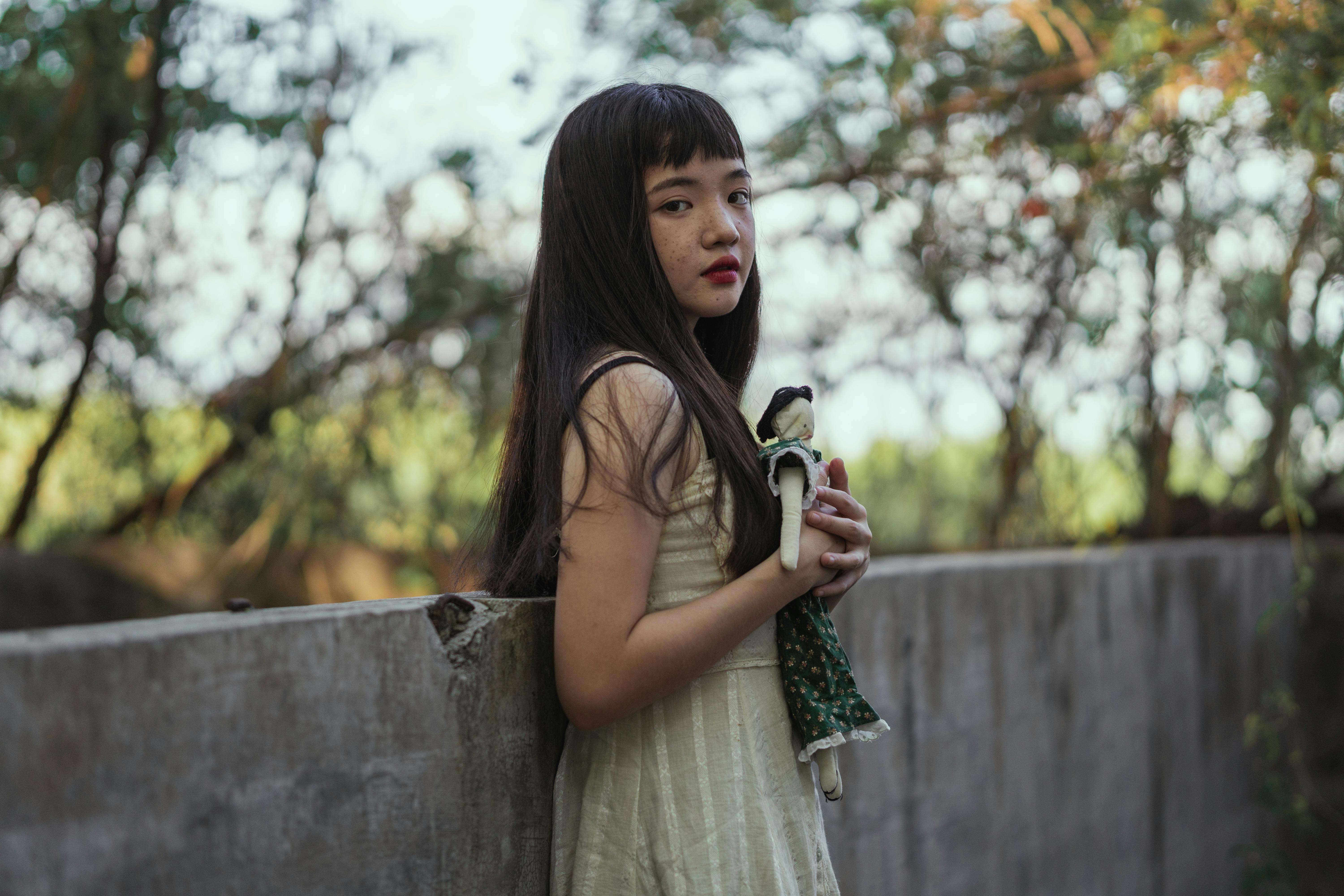 girl holding a doll