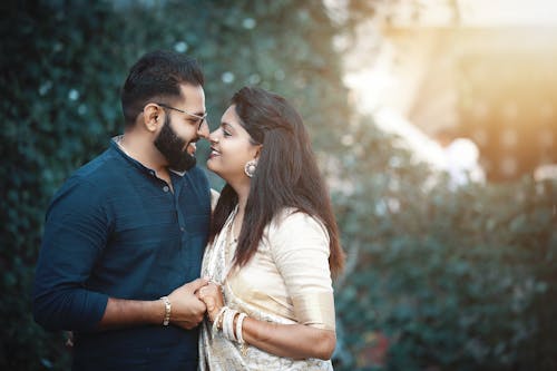 Free Man And Woman Facing Each Other Stock Photo