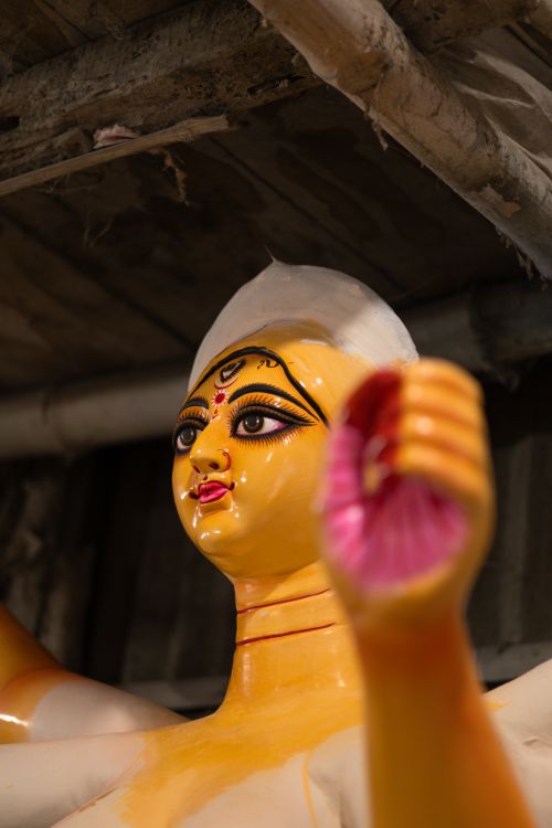Free Close-up of a Durga idol under preparation in Kolkata, highlighting cultural craftsmanship. Stock Photo