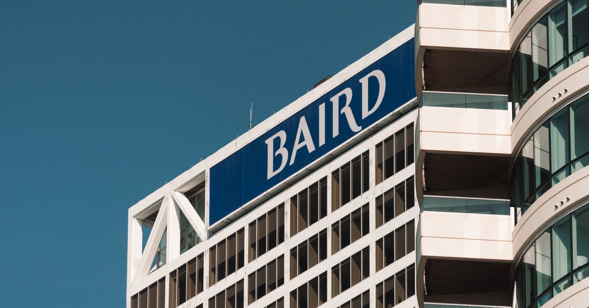 Modern architecture of the Baird building in Milwaukee, Wisconsin under a clear blue sky.
