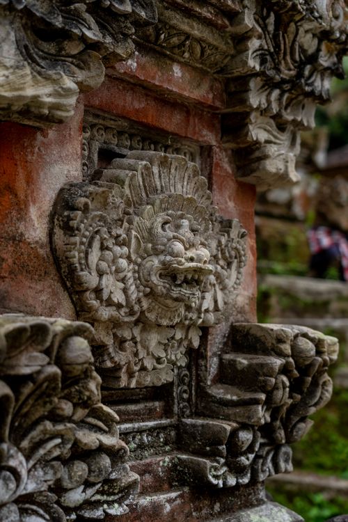 Free Close-up of intricate Balinese stone carving at a traditional temple. Stock Photo