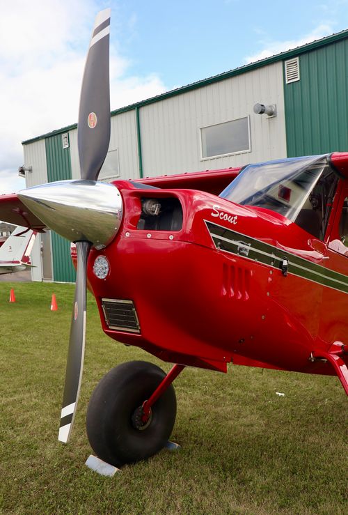 Free Close-up of a red Scout aircraft parked near a hangar in Sherwood Park, AB. Stock Photo
