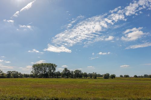 Free Beautiful summer day in Coesfeld, Germany, with a clear blue sky and lush green fields. Stock Photo
