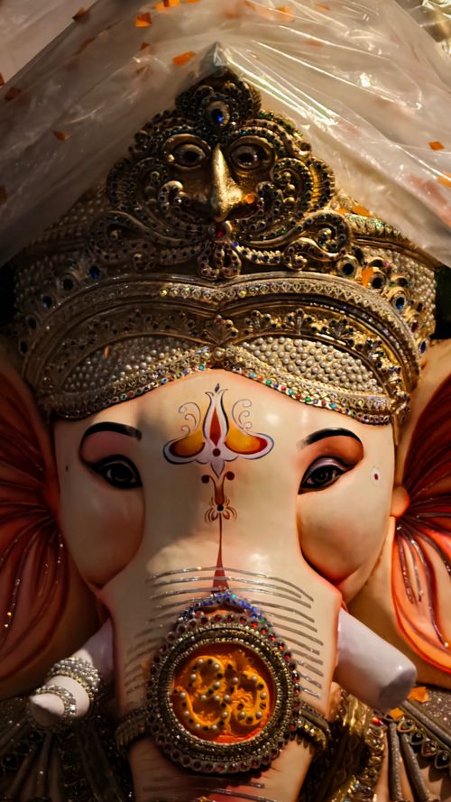Free Close-up of a detailed Ganesh idol in Mumbai, showcasing intricate craftsmanship and vibrant colors. Stock Photo