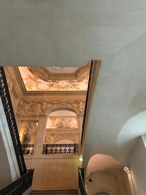 Free Explore the stunning ornate ceilings and arches of Parisian Baroque architecture, captured indoors. Stock Photo