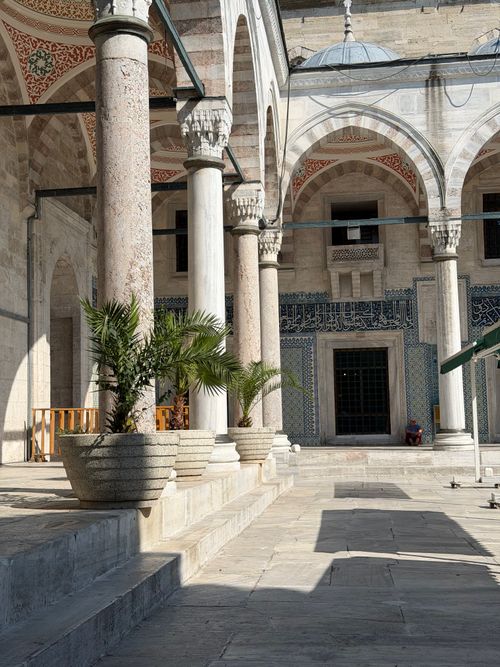 Free Beautiful courtyard of an Ottoman mosque in Istanbul showcasing intricate architecture and historical elements. Stock Photo