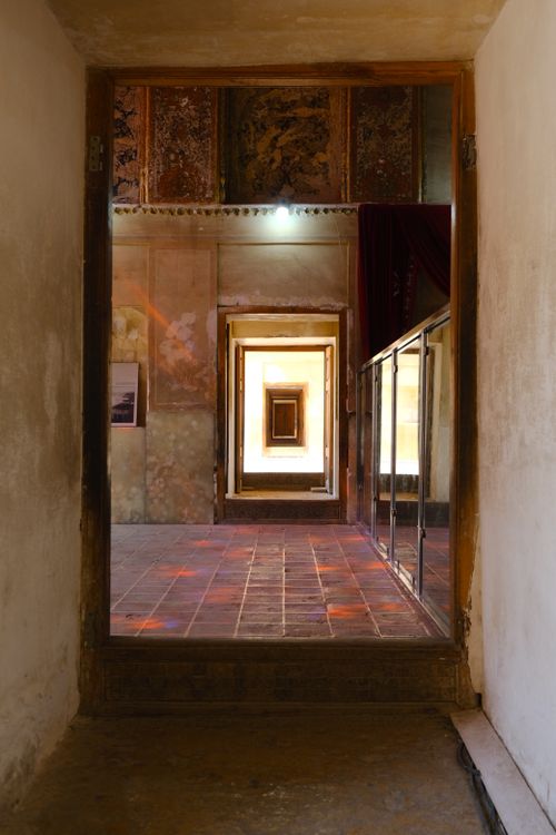 Free A captivating view through a series of doorways providing a symmetrical and artistic perspective. Stock Photo