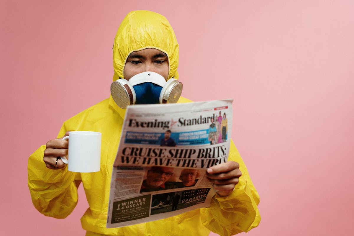 People sitting in an airport terminal where infections can spread in shared air
