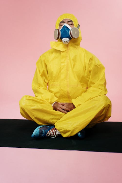 Person In Yellow Protective Suit