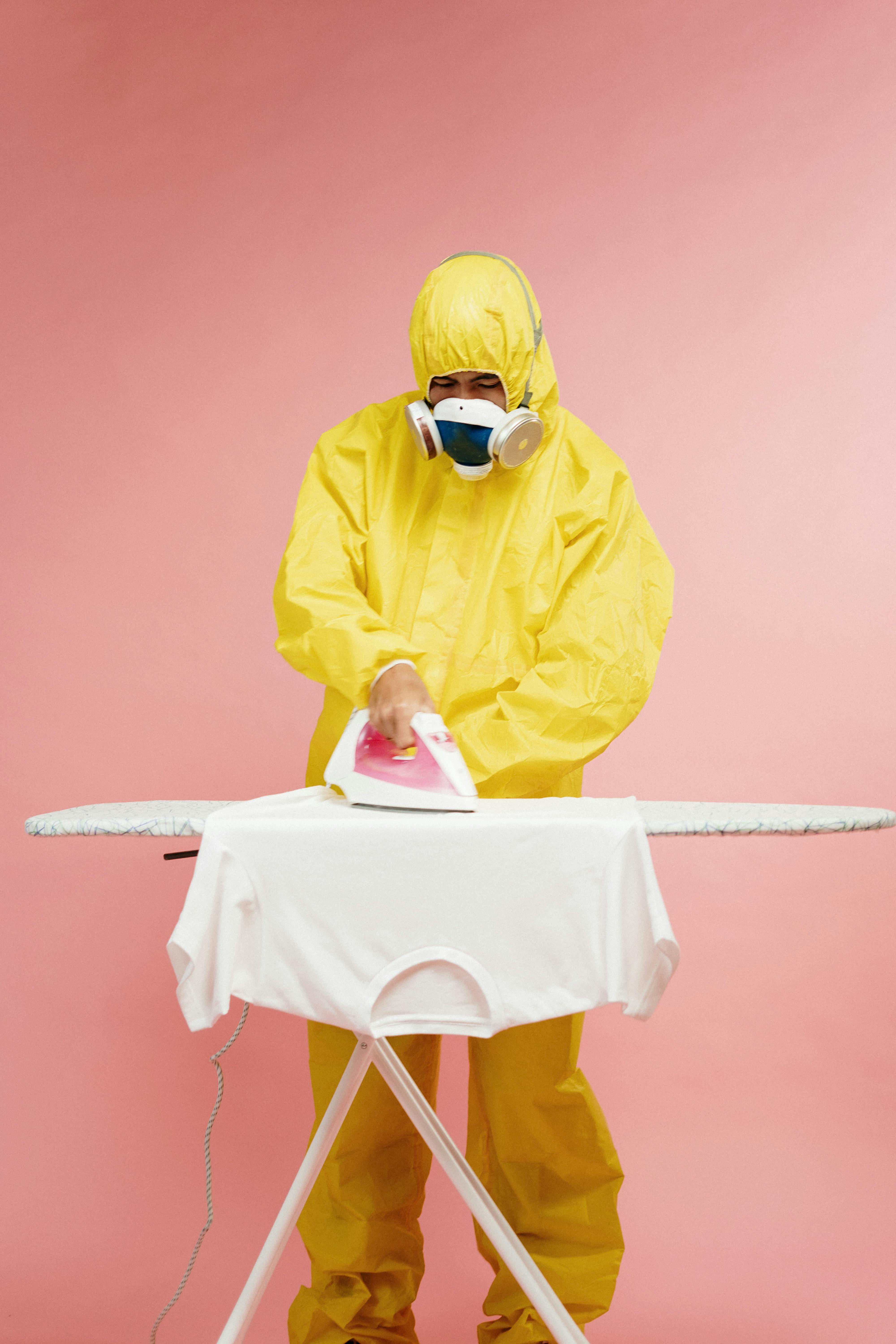 Person In Yellow Protective Suit · Free Stock Photo