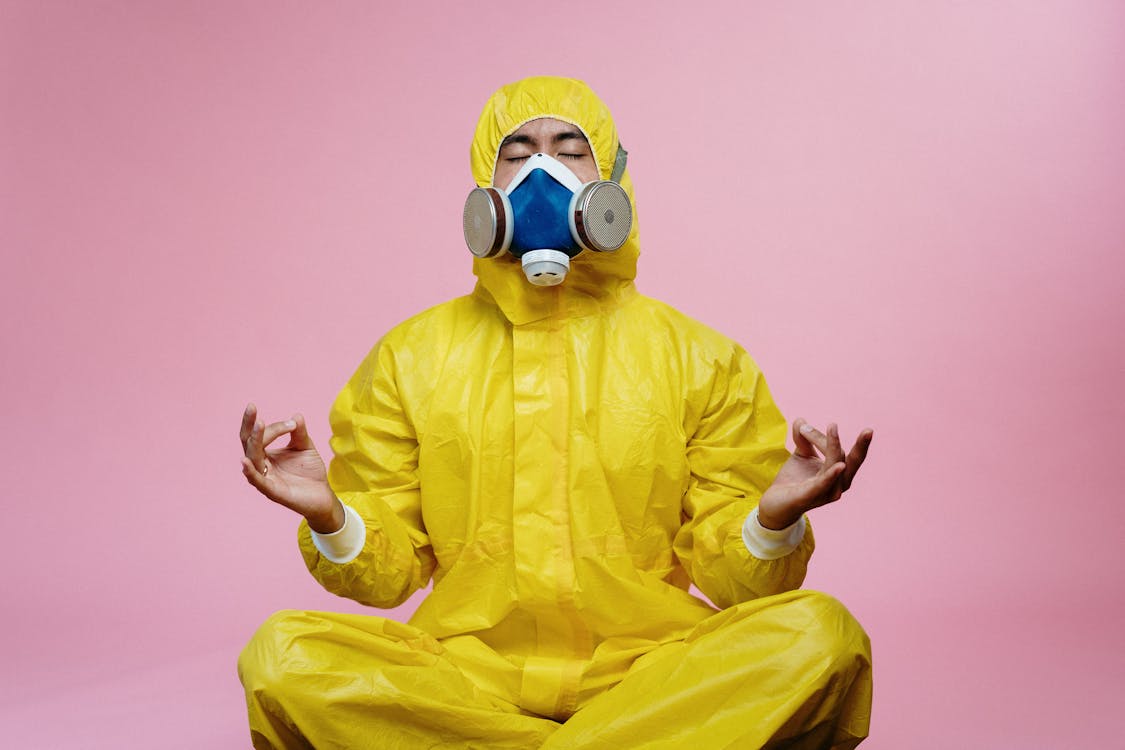 Free Man In Yellow Protective Suit  Stock Photo