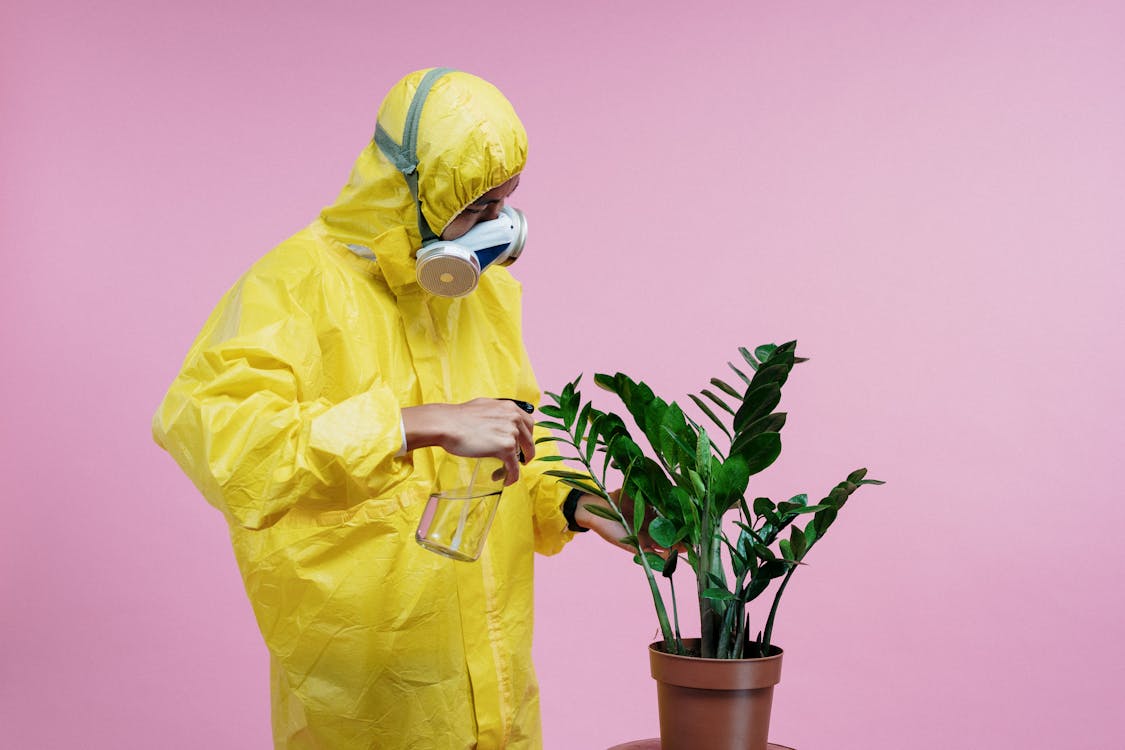Free Person In Yellow Protective Suit Stock Photo