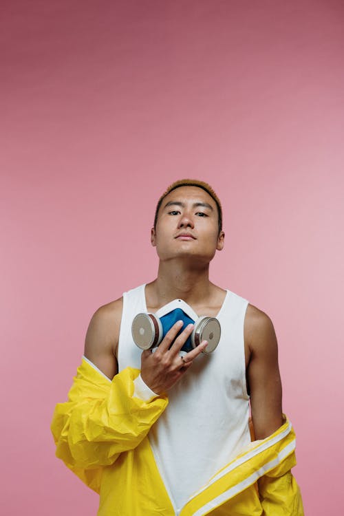 Free Man Wearing Yellow Coveralls Stock Photo