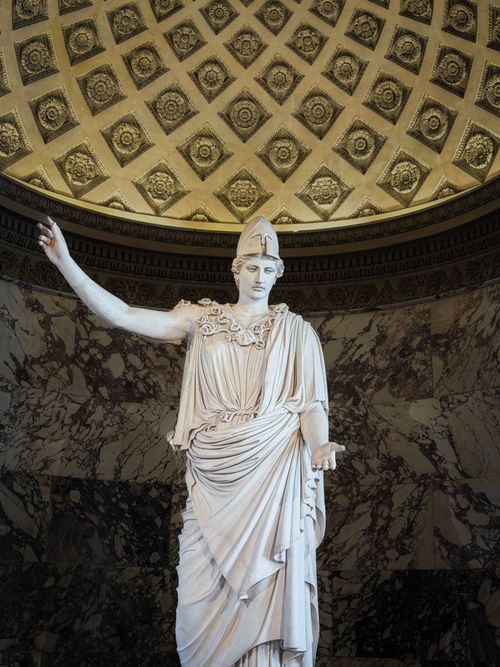 Free Marble statue of a Greek goddess under a decorative dome. Stock Photo