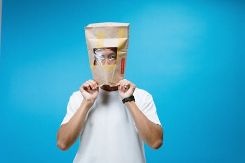 Man Wearing Paper Bag on Head