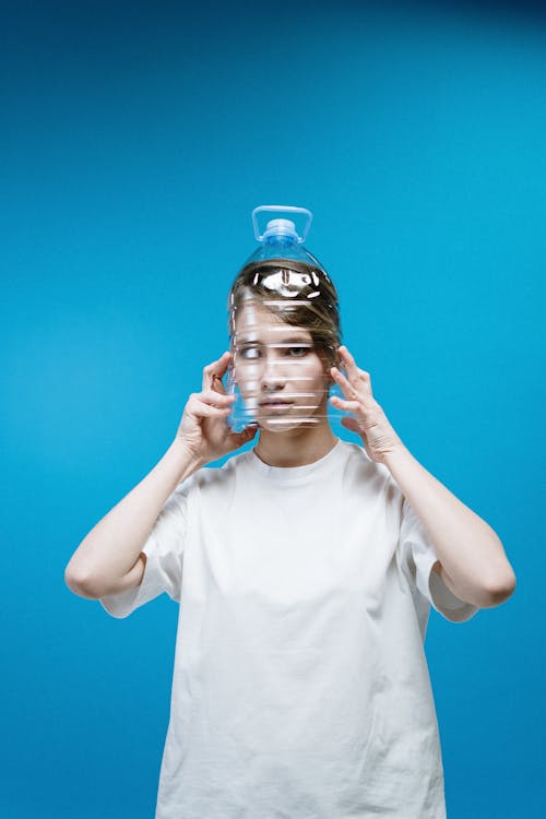 Woman Wearing Plastic Bottle on Head