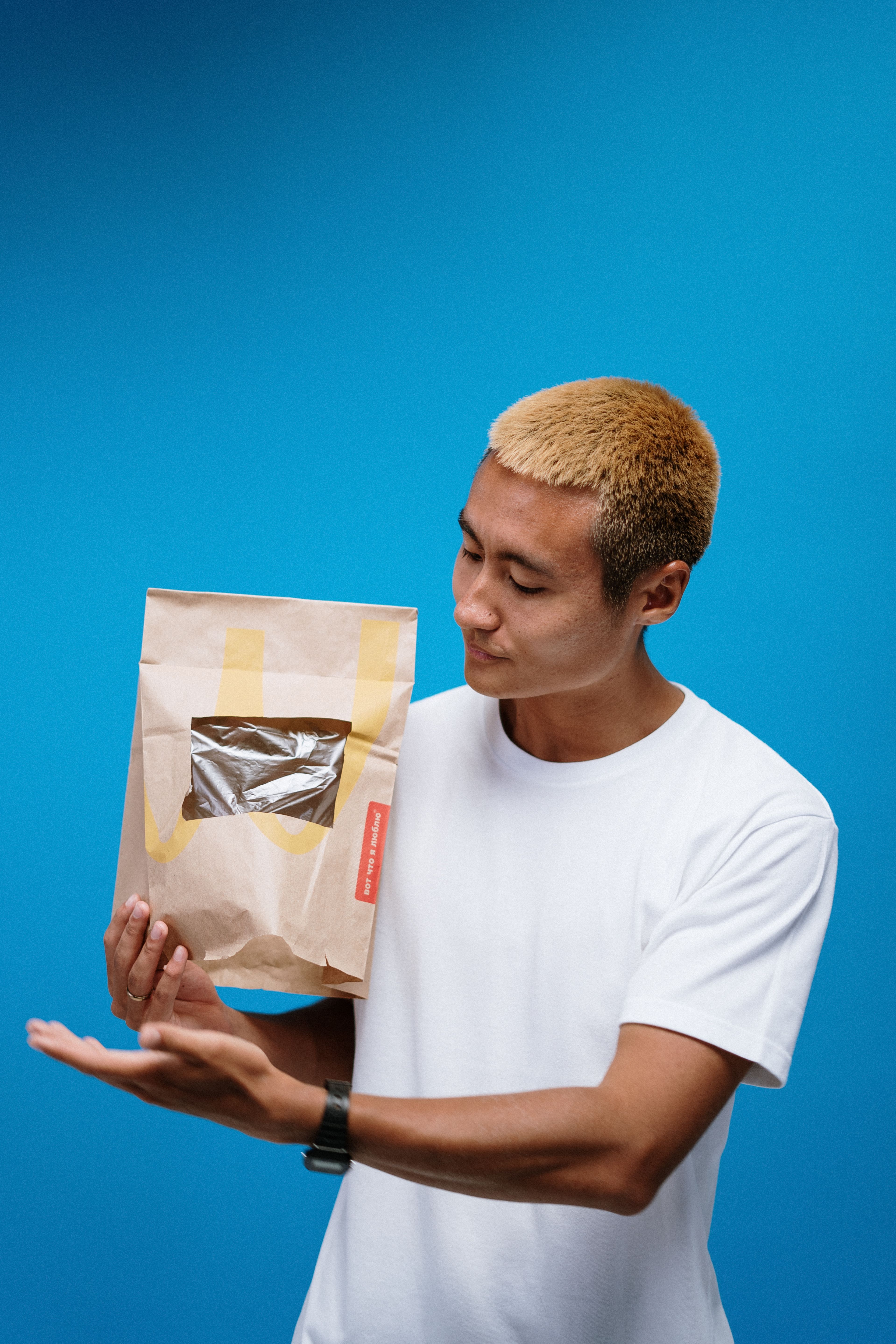 Man Holding Paper Bag · Free Stock Photo