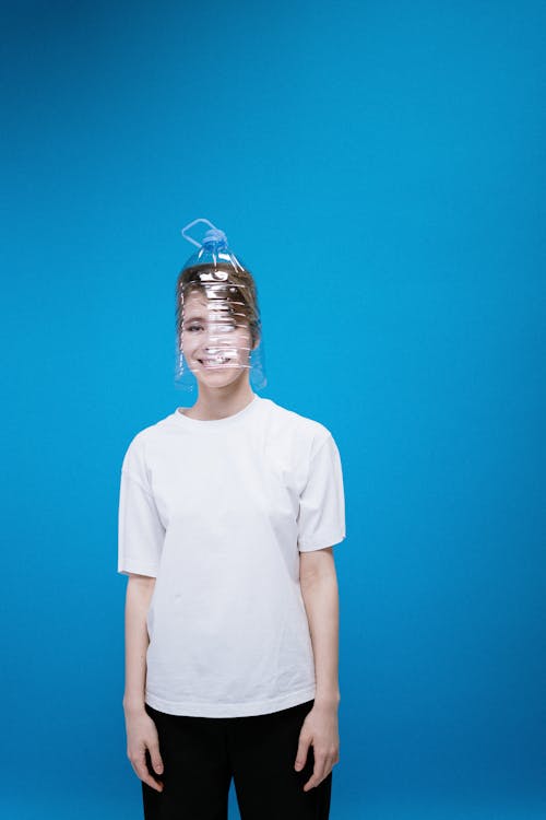 Woman Wearing Plastic Bottle on Head