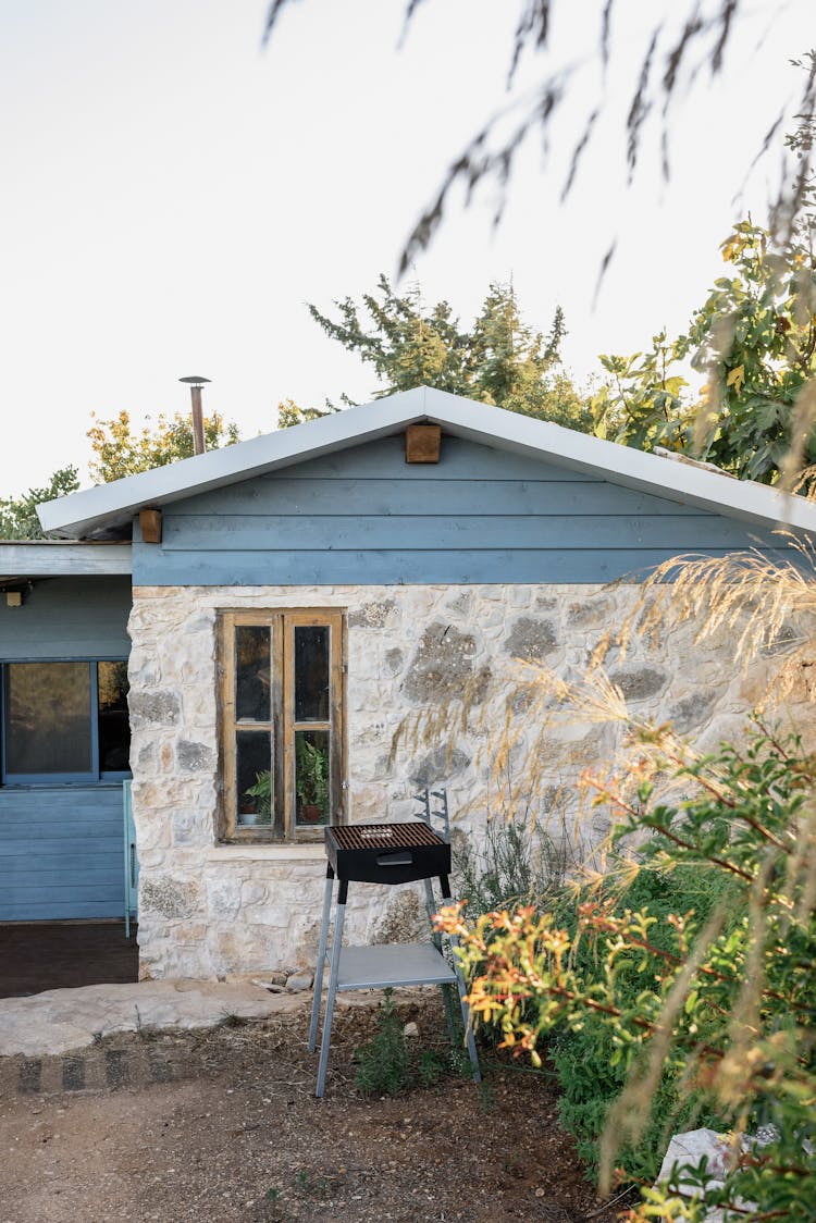 Backyard Of Small Countryside House In Sunny Day