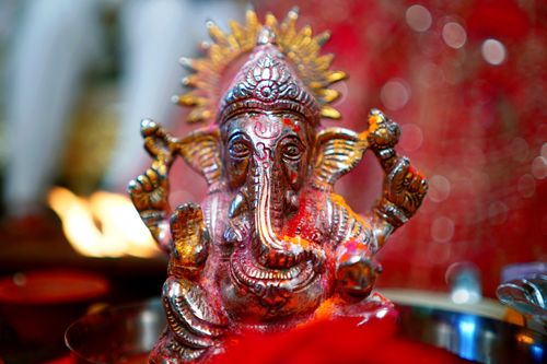 Free A vibrant close-up image of a Ganesh statue, highlighting Indian religious culture and tradition. Stock Photo