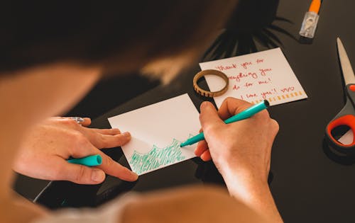 Person Drawing Using A Marker