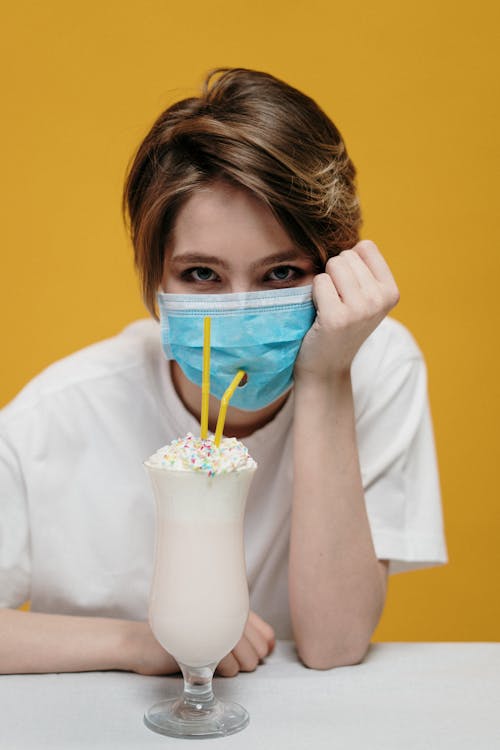 Free Woman Drinking Milkshake Stock Photo