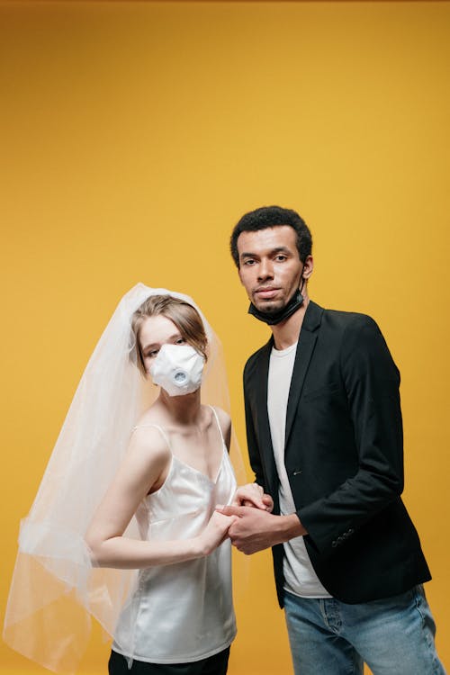 Free Man in Black Suit Jacket Beside Woman in White Wedding Dress Stock Photo