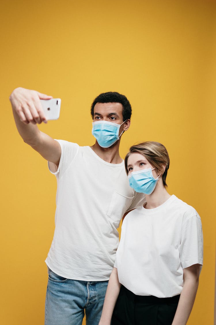 Man And Woman Taking A Selfie