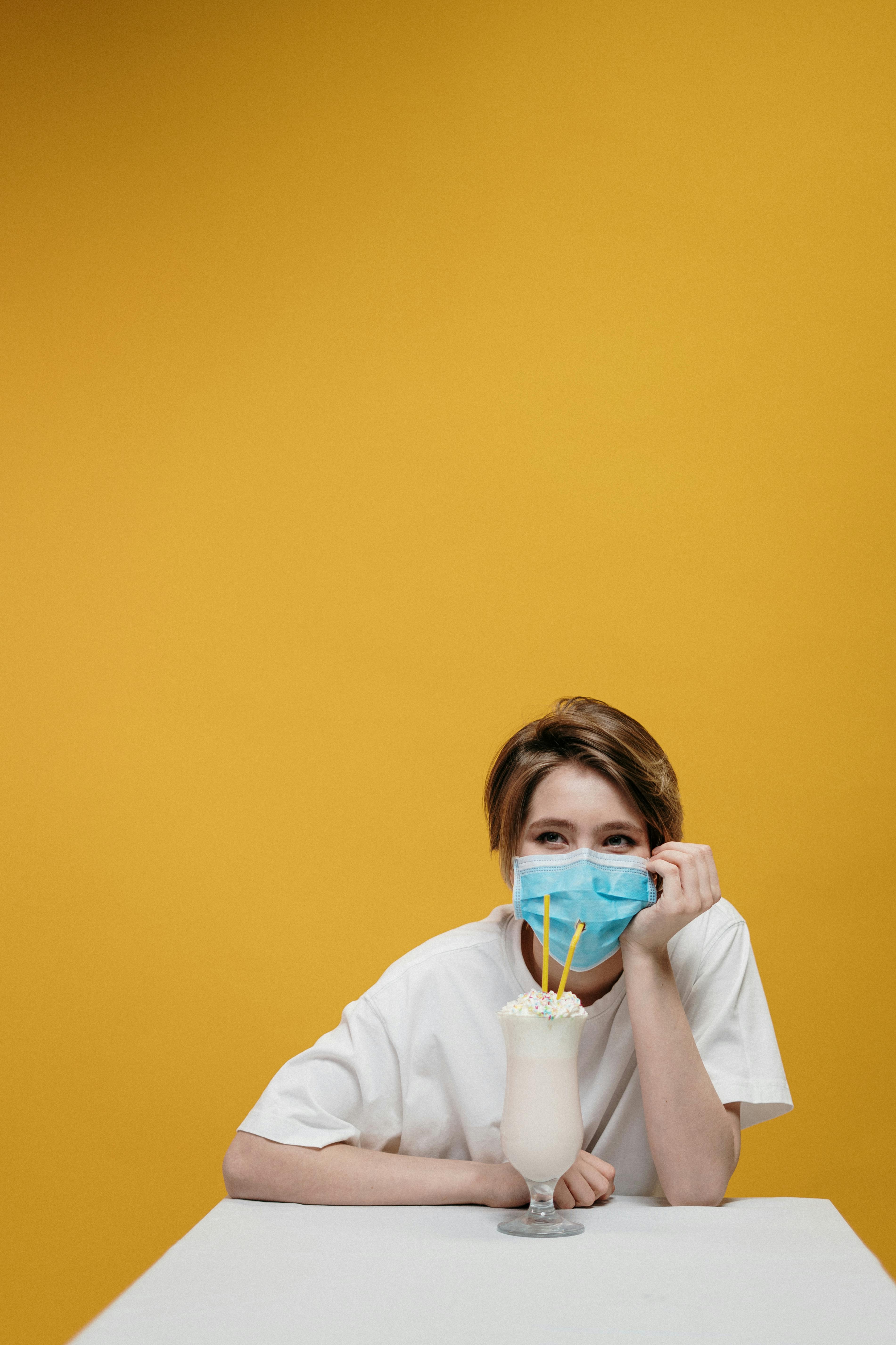 woman drinking milkshake