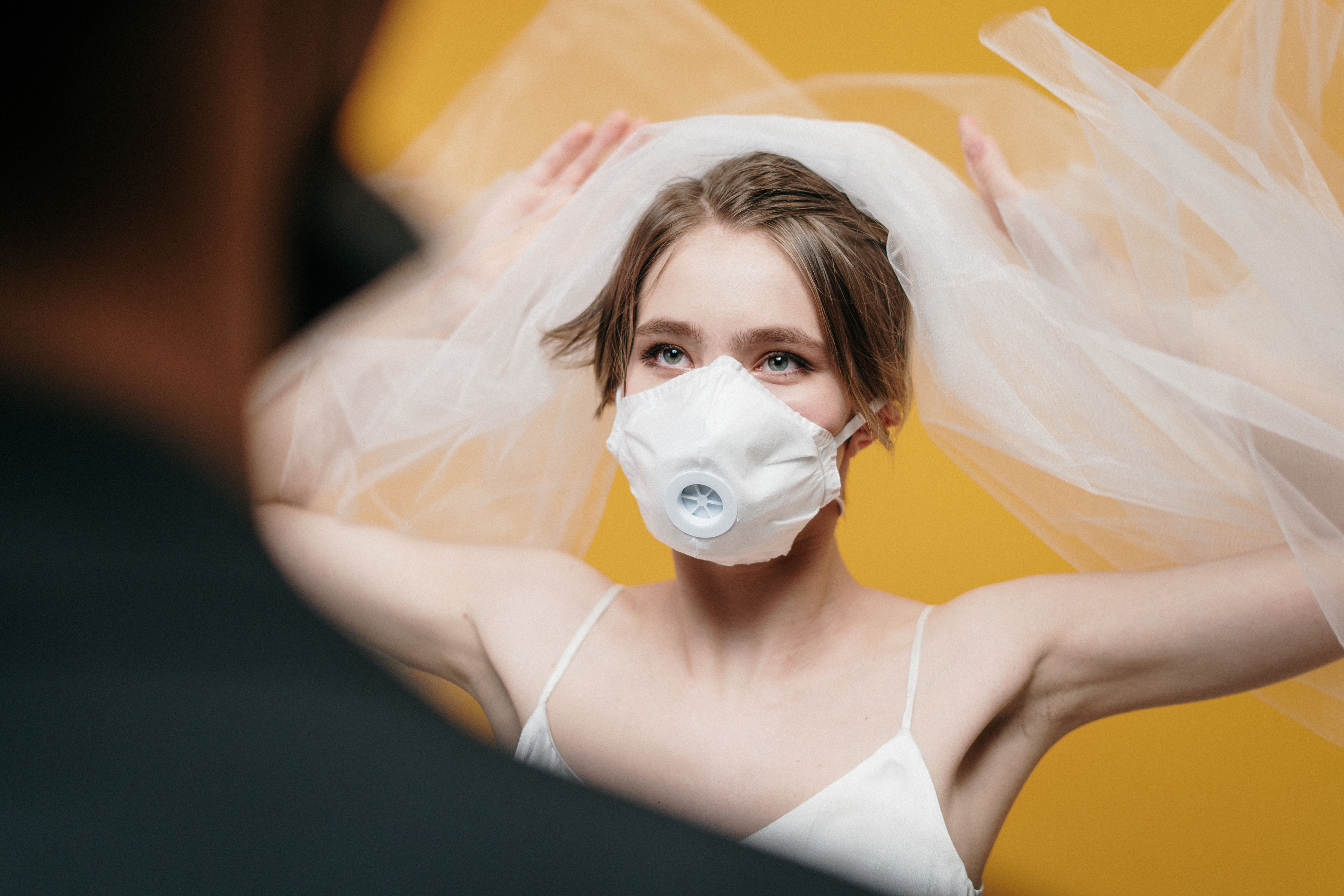 Woman in White Dress Wearing White Face Mask