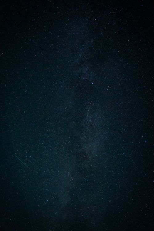 Free Captivating view of the Milky Way galaxy under a dark night sky, showcasing celestial beauty. Stock Photo