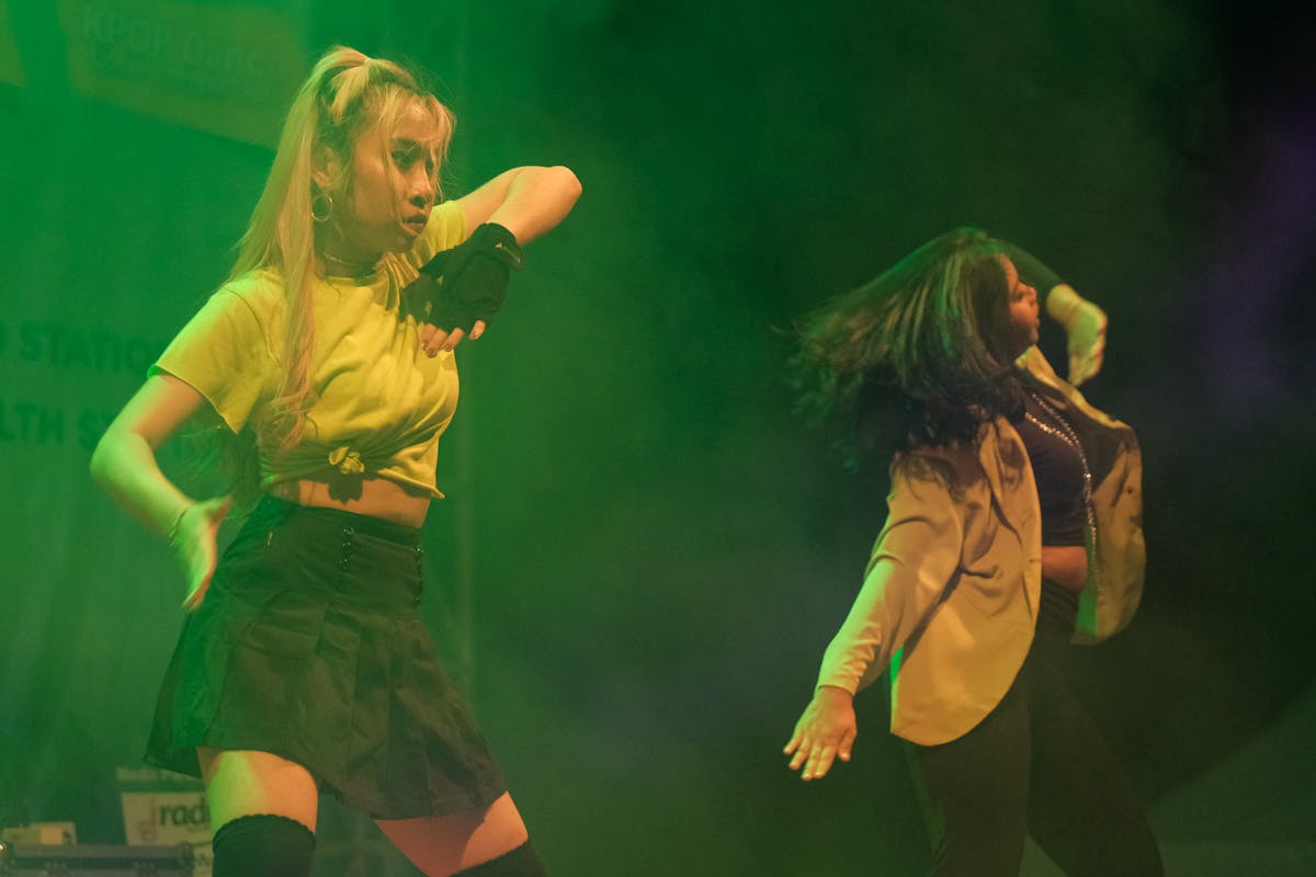 Doctor holding a vaccine vial and syringe in a clinic