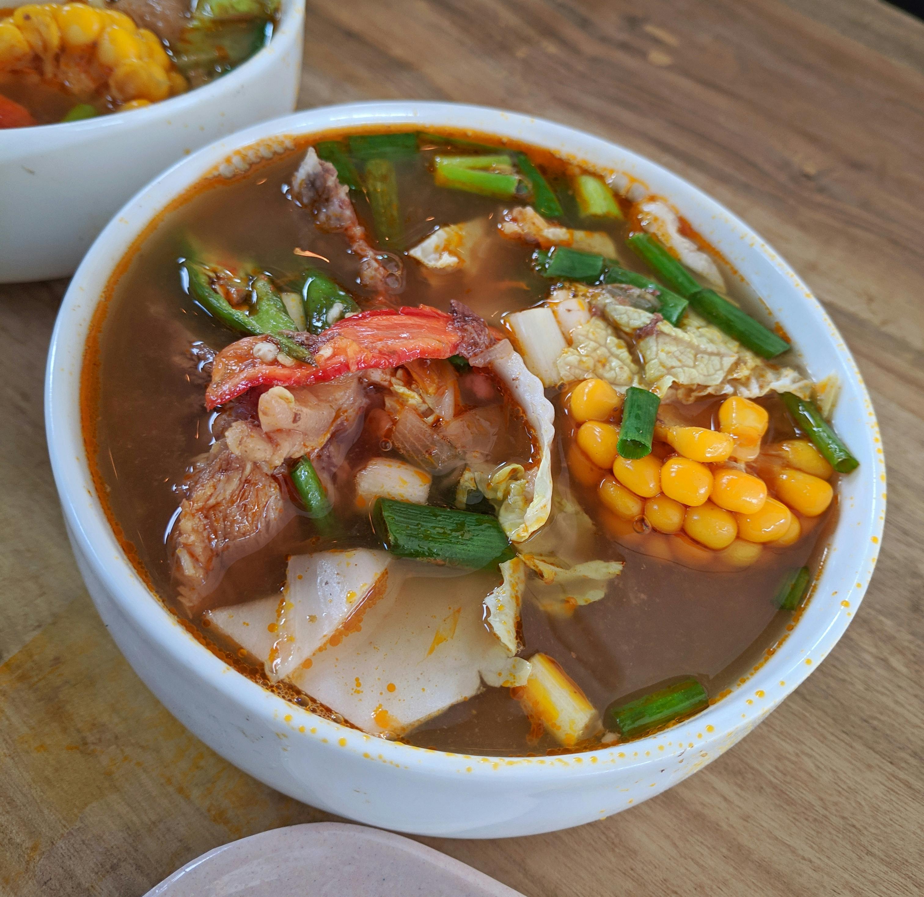 Microscope examining blood samples, representing scientific inquiry into blood types.