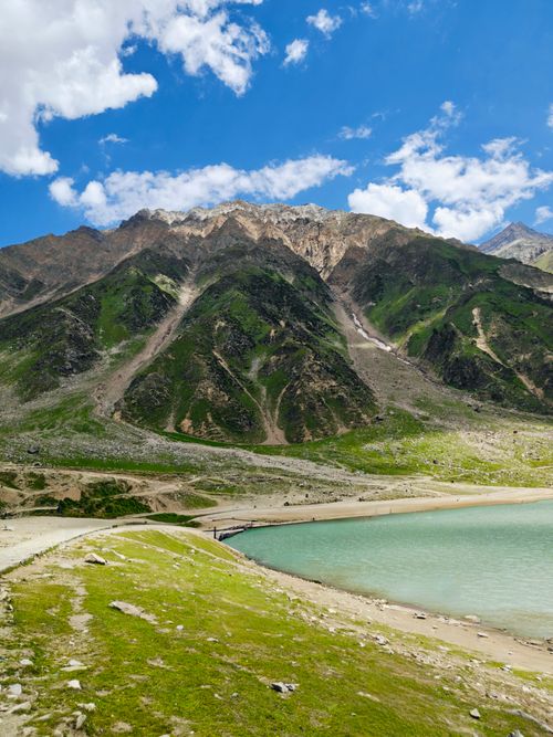 Free Breathtaking view of mountains and turquoise lake in Khyber Pakhtunkhwa, Pakistan. Stock Photo