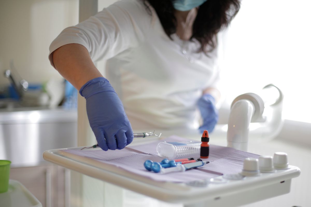 Dental team providing patient consultation and care