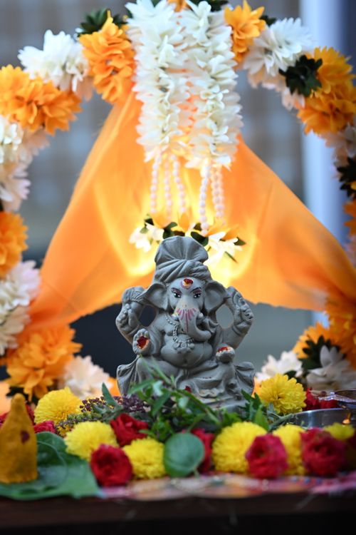 Free Beautifully decorated Ganesh idol with colorful flowers in Bengaluru for Ganesh Chaturthi celebration. Stock Photo