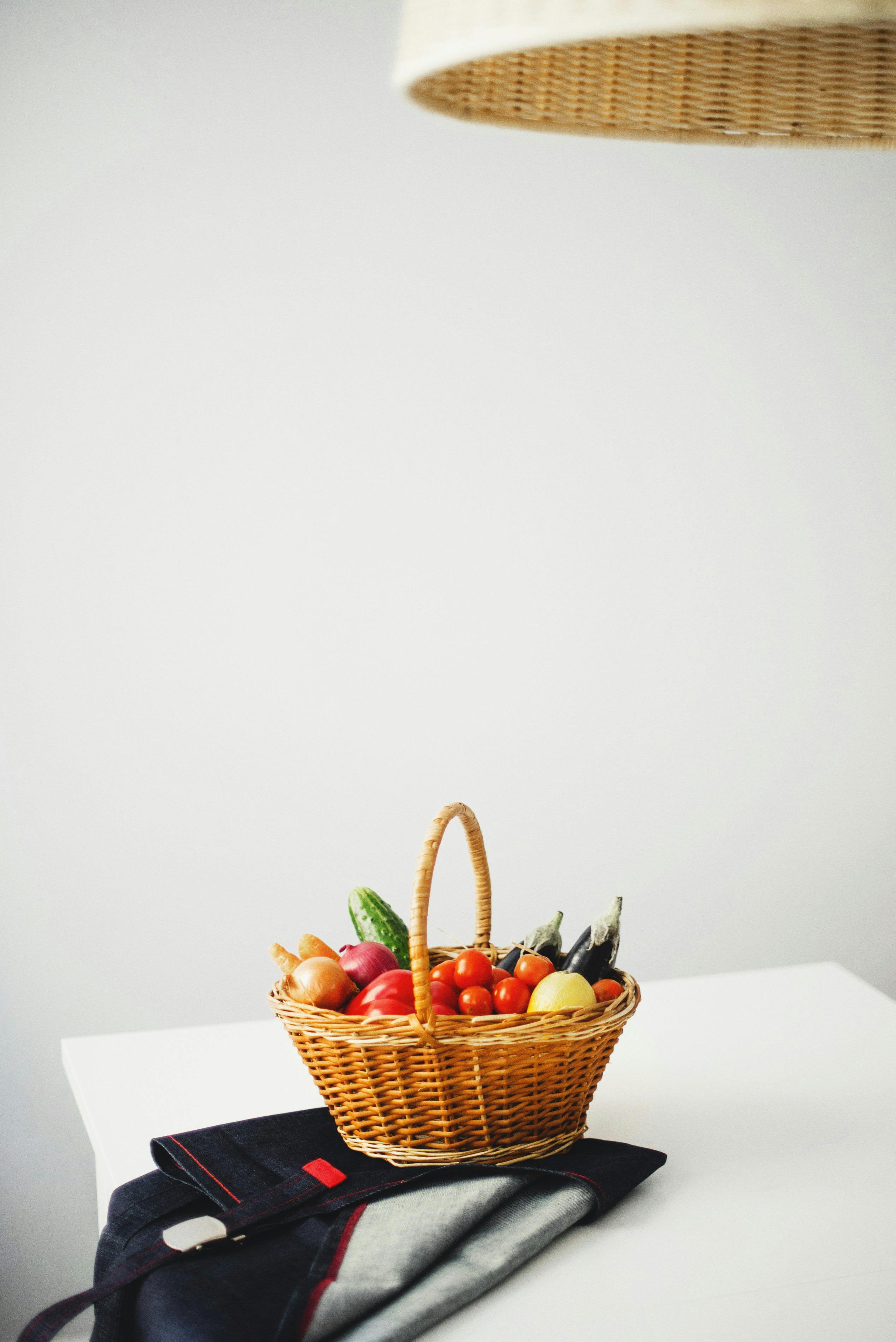 brown woven basket on white table