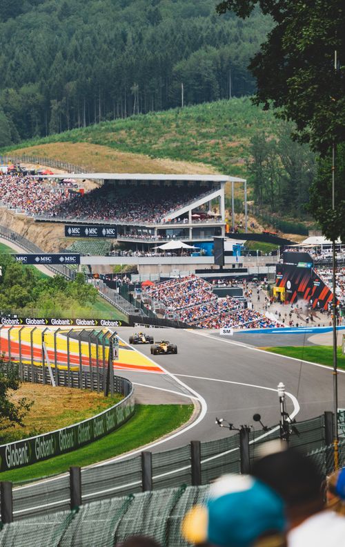 Free Vibrant crowd at Spa-Francorchamps enjoying thrilling racing action, Belgium. Stock Photo