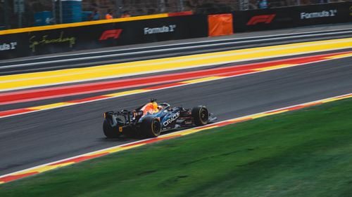 Free High-speed Formula 1 car on the Circuit de Spa-Francorchamps in Stavelot, Belgium during a sunny race day. Stock Photo