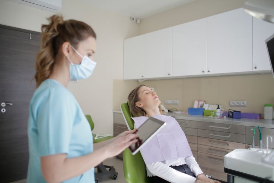 Orthodontist reviewing a treatment plan with a patient