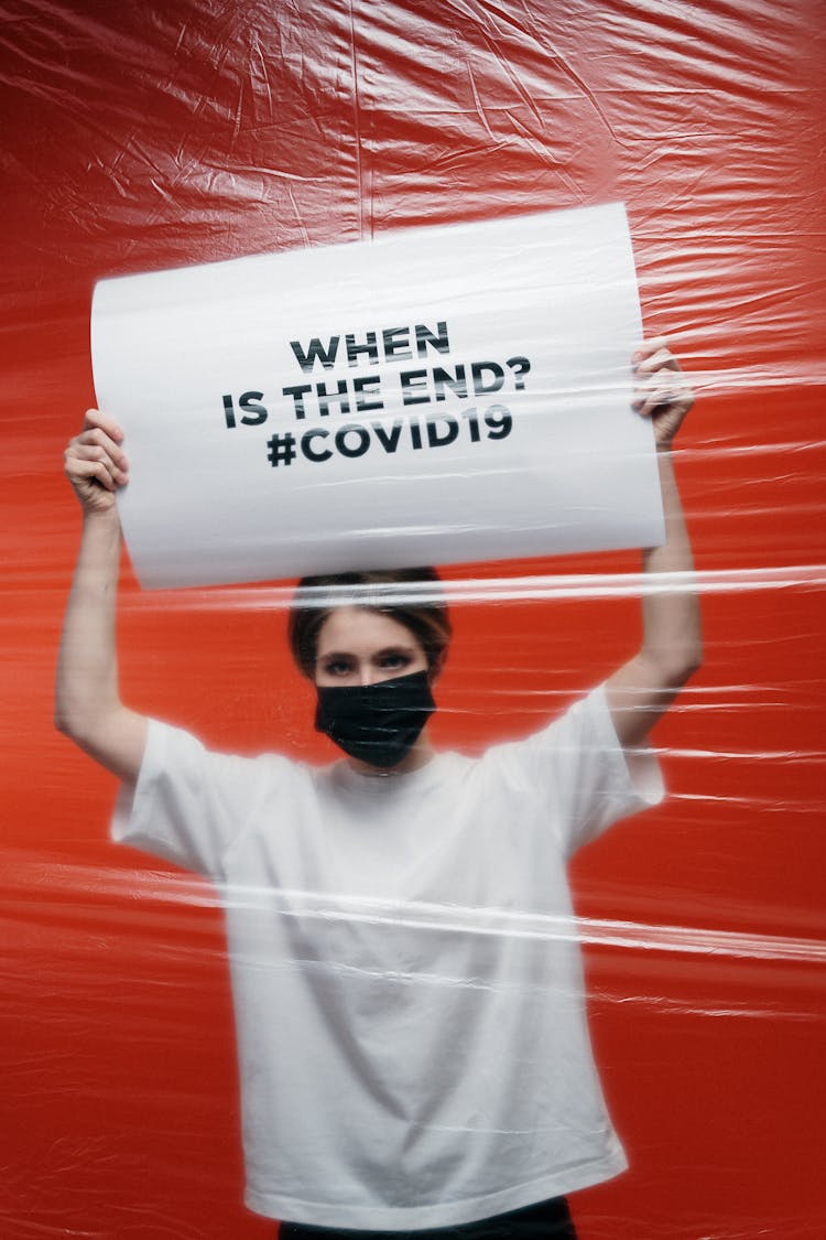 Woman Holding A Poster With Anxiety