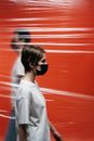 People Wearing Face Mask Standing Side By Side