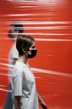 People Wearing Face Mask Standing Side By Side