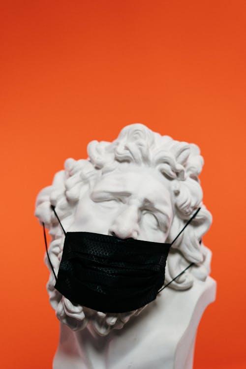 Free White Concrete Sculpture With Face Mask Stock Photo